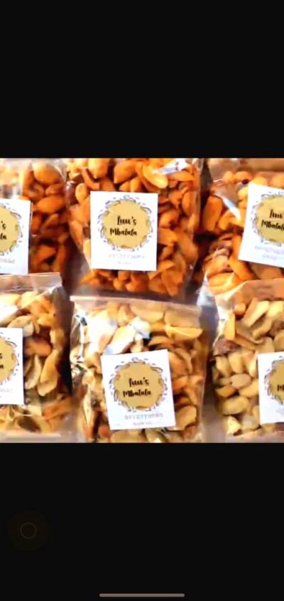 Selling  groundnuts  to students as a special snack