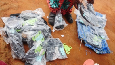 Donating footwear to a vulnerable community of Chisamba District of Zambian 